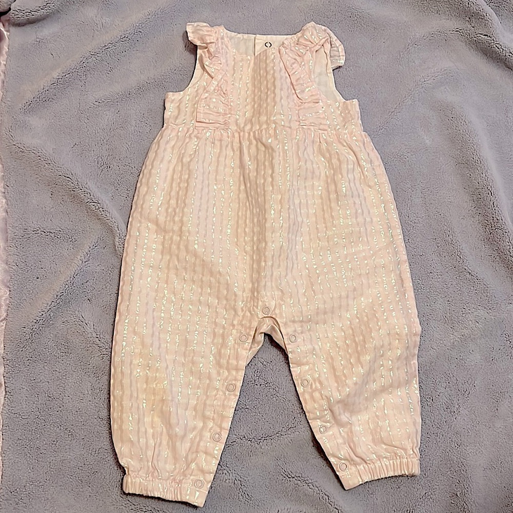 Baby Cat & Jack. 6-9months. Body: 77% cotton.23% polyester. Lining: 100% cotton.